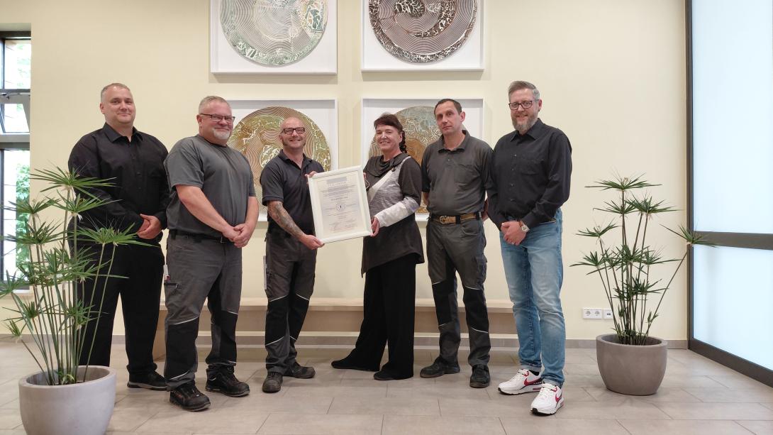 Jena Crematorium team with the renewed award