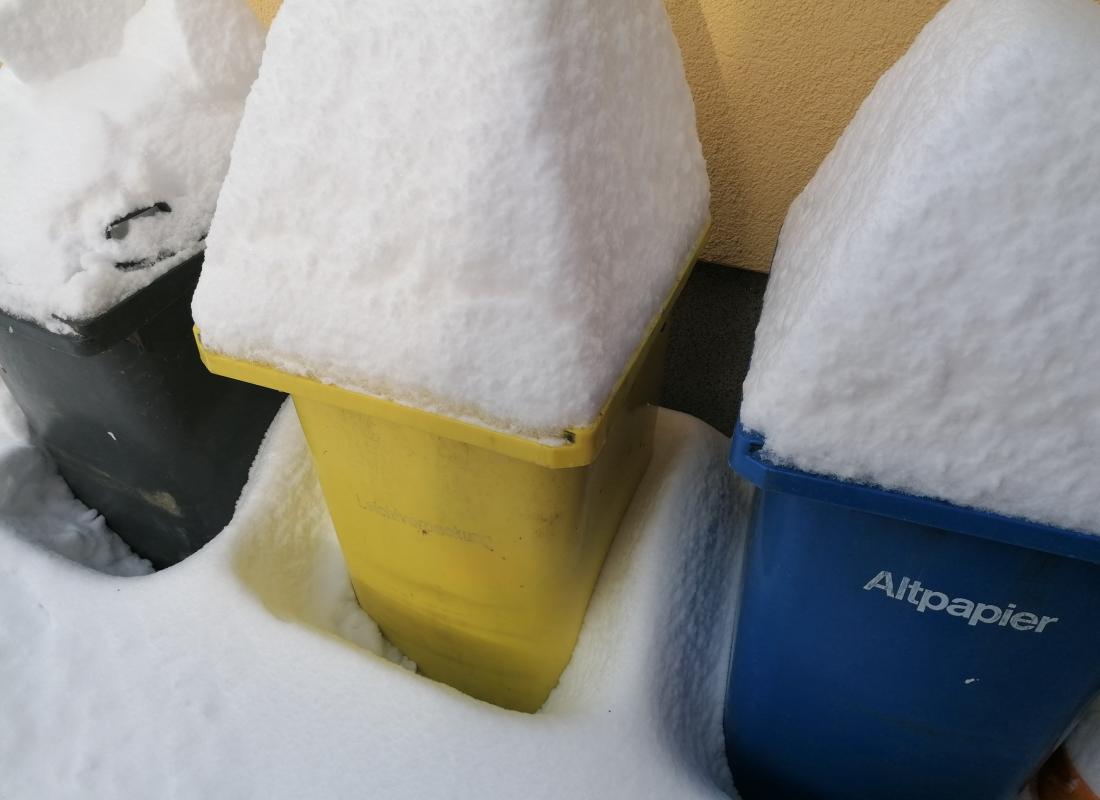Litter garbage can with snow cover